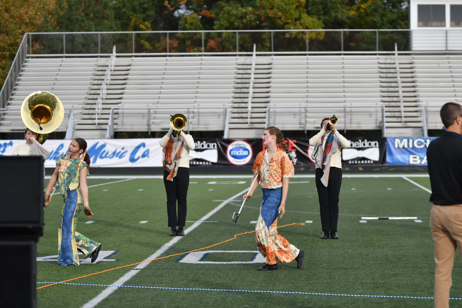 South Lyon marching band performing on the field