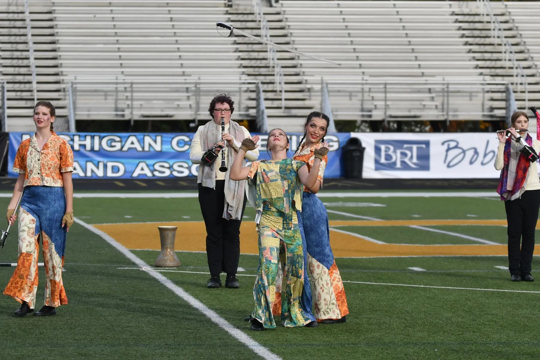 South Lyon students performing a marching band show together