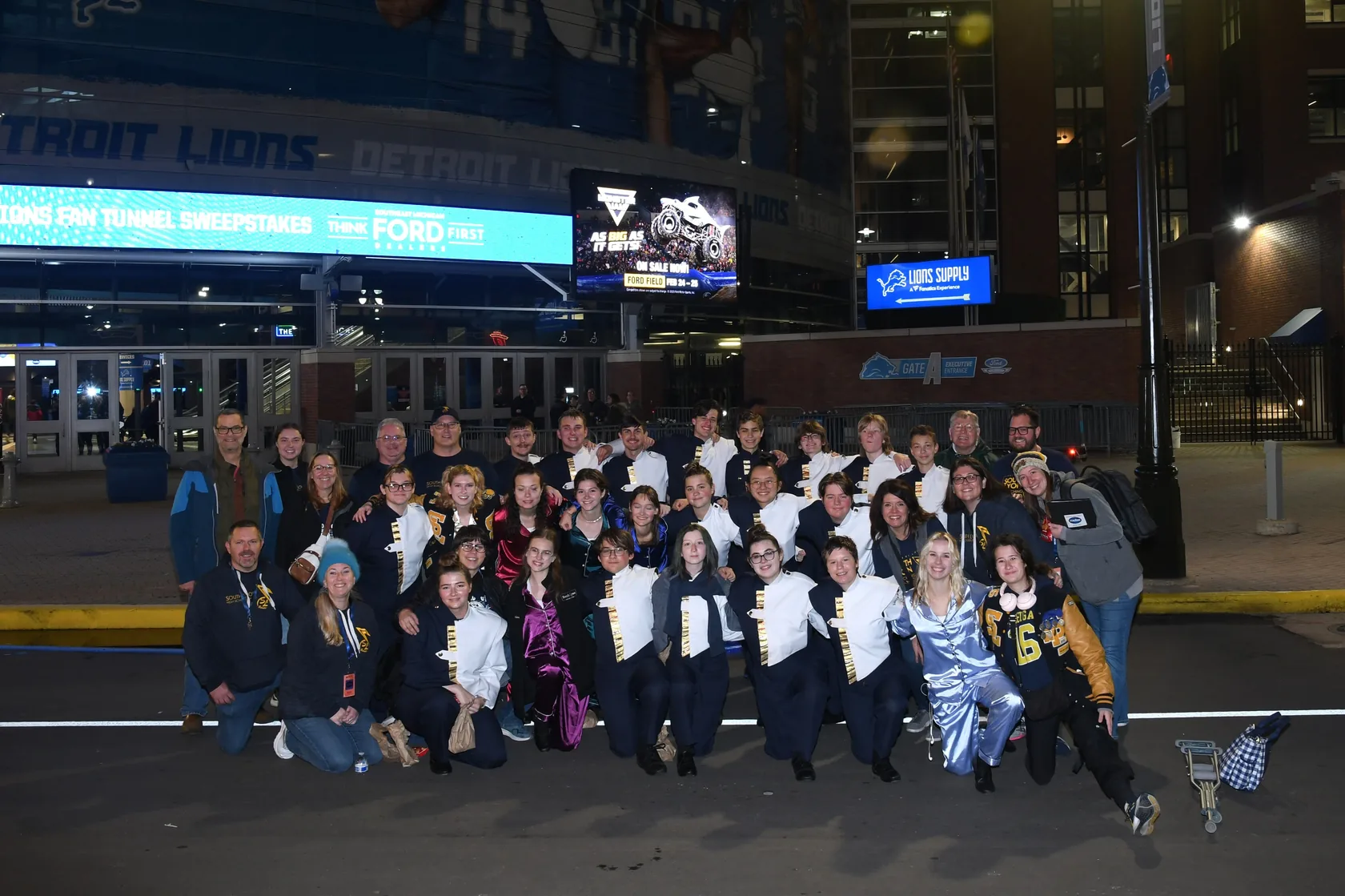 South Lyon band students gathered for a group photograph outside Ford Field in Detroit in 2023